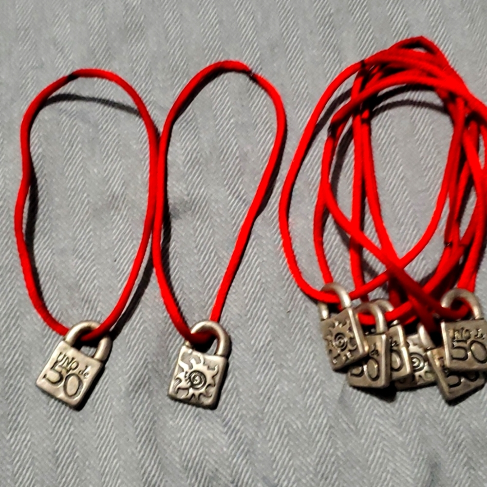 Uno De 50 Strings With Big Lock Charm. 8 Availabl… - image 1